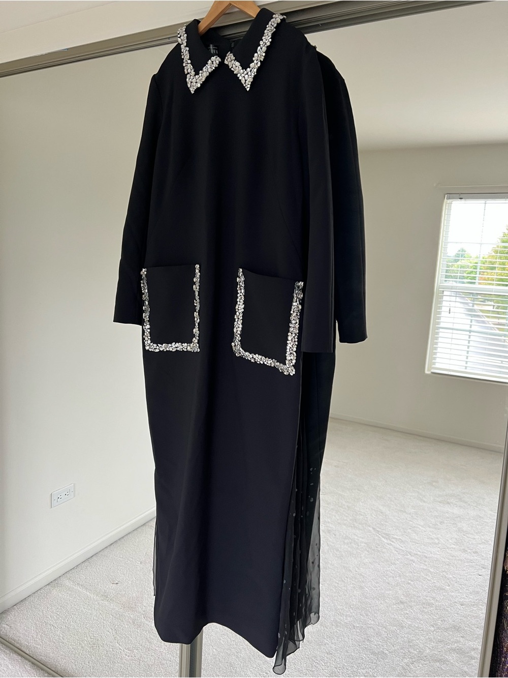 Black Long-Sleeve Maxi Dress with Embellished Collar and Pockets